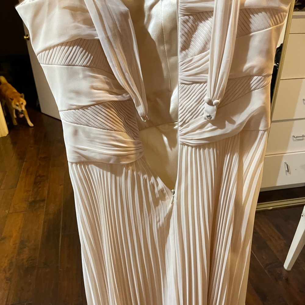 Worn once lovely figure flattering size four